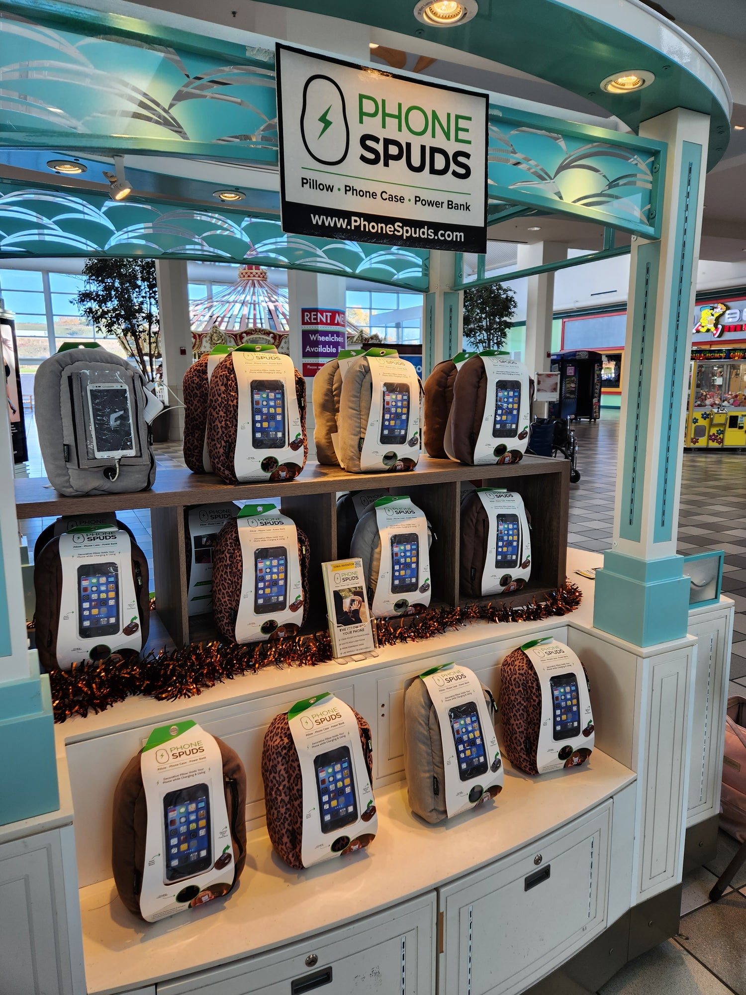phone spuds displayed at a kiosk at a shopping mall