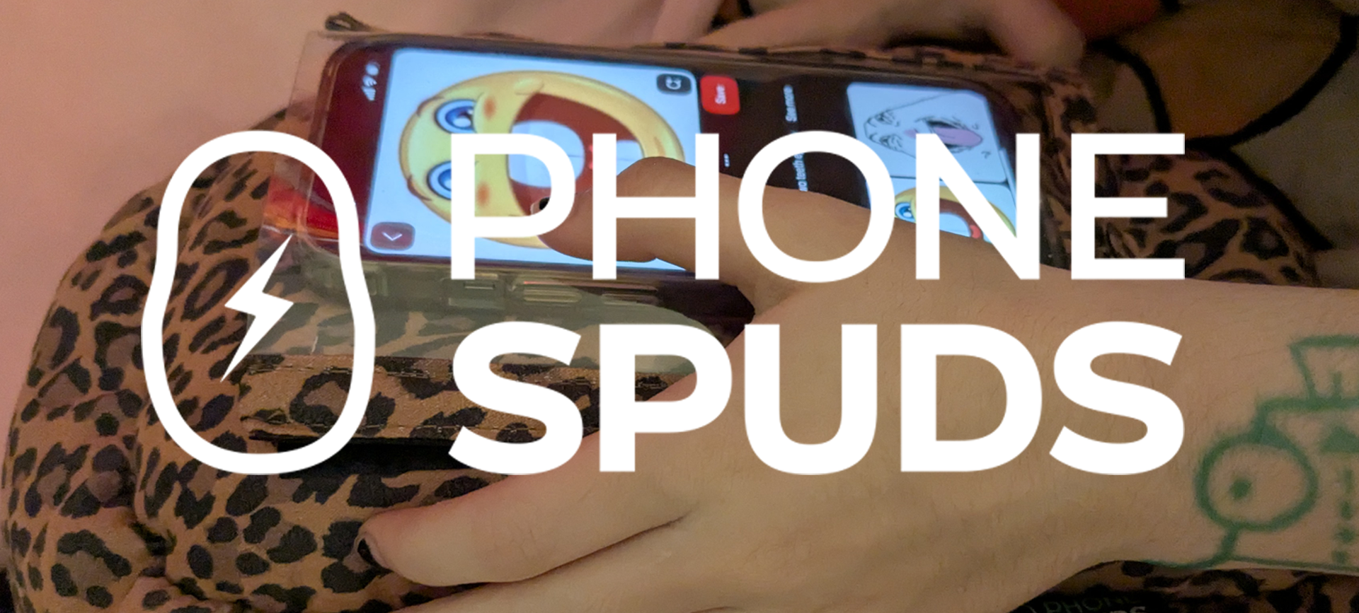 closeup of a hand using a phone that is inserted in the phone pocket of a leopard print phonespud. a large white phonespuds logo is in the foreground